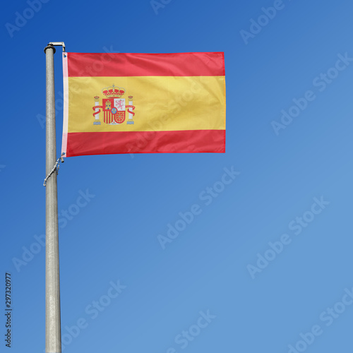 Flag of Spain in blue sky