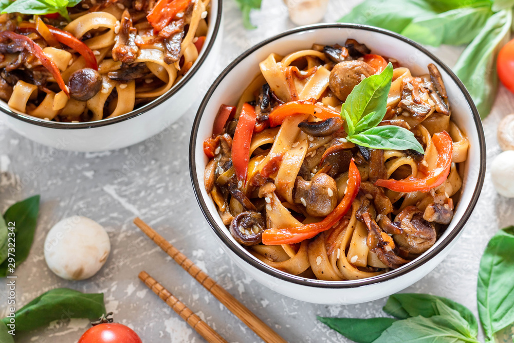 Wheat noodles udon with mushrooms and vegetables in Tereyaki sauce Wheat noodles udon with mushrooms and vegetables in Tereyaki sauce