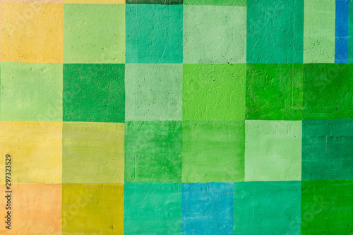 Varicoloured background of yellow, green and blue squares