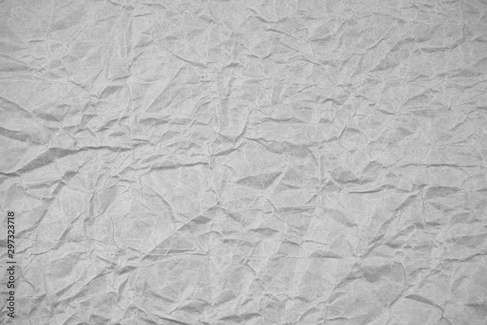 White crumpled packaging paper background texture. Grey Kraft Paper Coarse. Wrinkled paper bag White crumpled packaging paper background texture. Grey Kraft Paper Coarse. Wrinkled paper bag