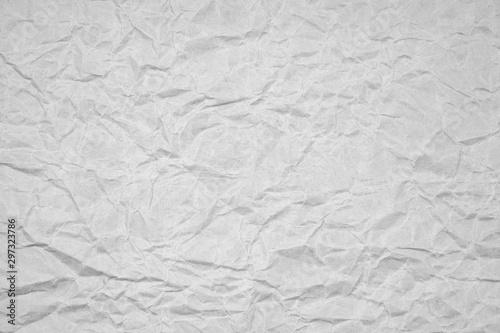 White crumpled packaging paper background texture. Grey Kraft Paper Coarse. Wrinkled paper bag