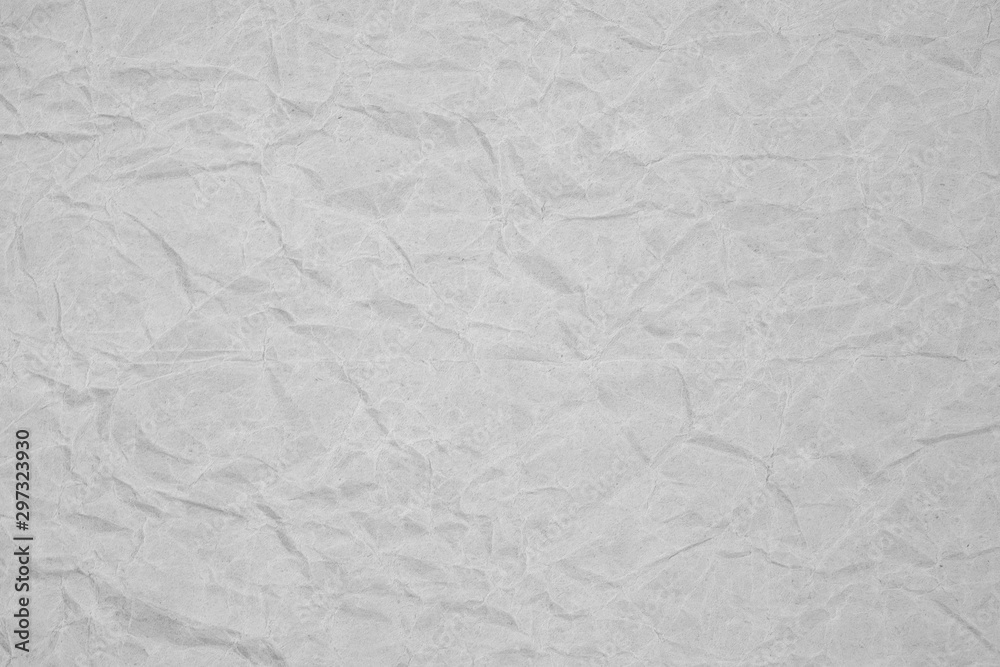 White crumpled packaging paper background texture. Grey Kraft Paper Coarse. Wrinkled paper bag White crumpled packaging paper background texture. Grey Kraft Paper Coarse. Wrinkled paper bag