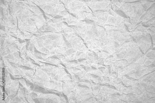 White crumpled packaging paper background texture. Grey Kraft Paper Coarse. Wrinkled paper bag