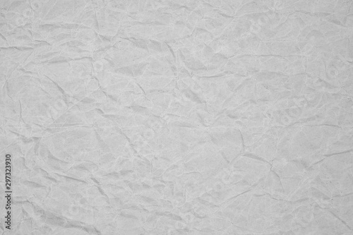 White crumpled packaging paper background texture. Grey Kraft Paper Coarse. Wrinkled paper bag
