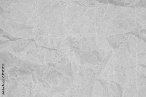 White crumpled packaging paper background texture. Grey Kraft Paper Coarse. Wrinkled paper bag