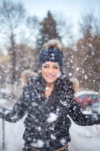 Beautiful young woman in a fur coat