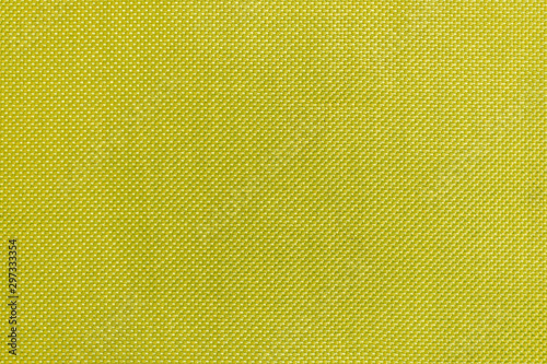 Texture of green textile fabric material with pattern background
