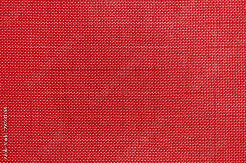 Texture of red textile fabric material with pattern background
