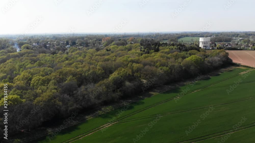 Agricultural Woodland Landscape Old White Water Tower Sunny Spring Day Aerial 4K Agricultural Woodland Landscape Old White Water Tower Sunny Spring Day Aerial 4K