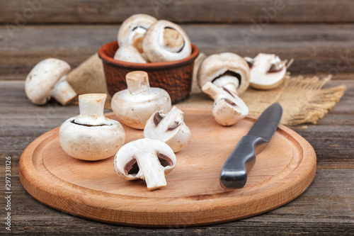 Fresh fruits of mushrooms on a wooden board