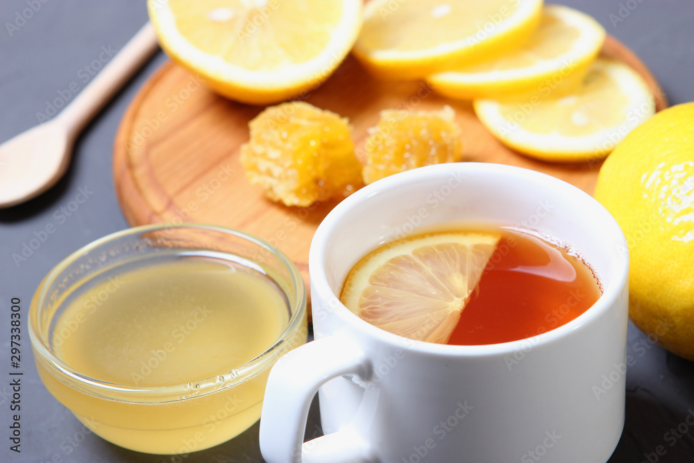 tea, honey and lemon on the table top view.