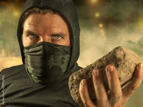 Картината върху платно young man as ultra and radical anarchist rioter