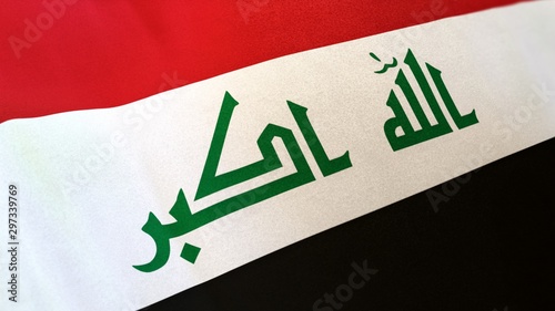 3D rendering of the national flag of Irak waving in the wind. The banner/emblem is made of realistic satin texture and rendered in a daylight situation.  photo
