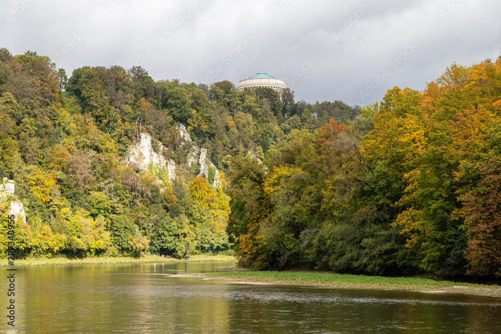 Nature reserve at Danube river breakthrough near Kelheim, Bavaria, Germany in autumn with limestone rock formations and plants with colorful leaves, autumnal impressions Nature reserve at Danube river breakthrough near Kelheim, Bavaria, Germany in autumn with limestone rock formations and plants with colorful leaves, autumnal impressions