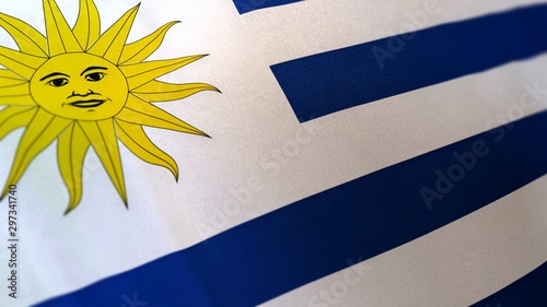 3D rendering of the national flag of Uruguay waving in the wind. The banner/emblem is made of realistic satin texture and rendered in a daylight situation.  photo