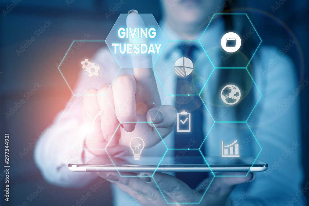 Writing note showing Giving Tuesday. Business concept for international day of charitable giving Hashtag activism Woman wear formal work suit present using smart latest device Writing note showing Giving Tuesday. Business concept for international day of charitable giving Hashtag activism Woman wear formal work suit present using smart latest device