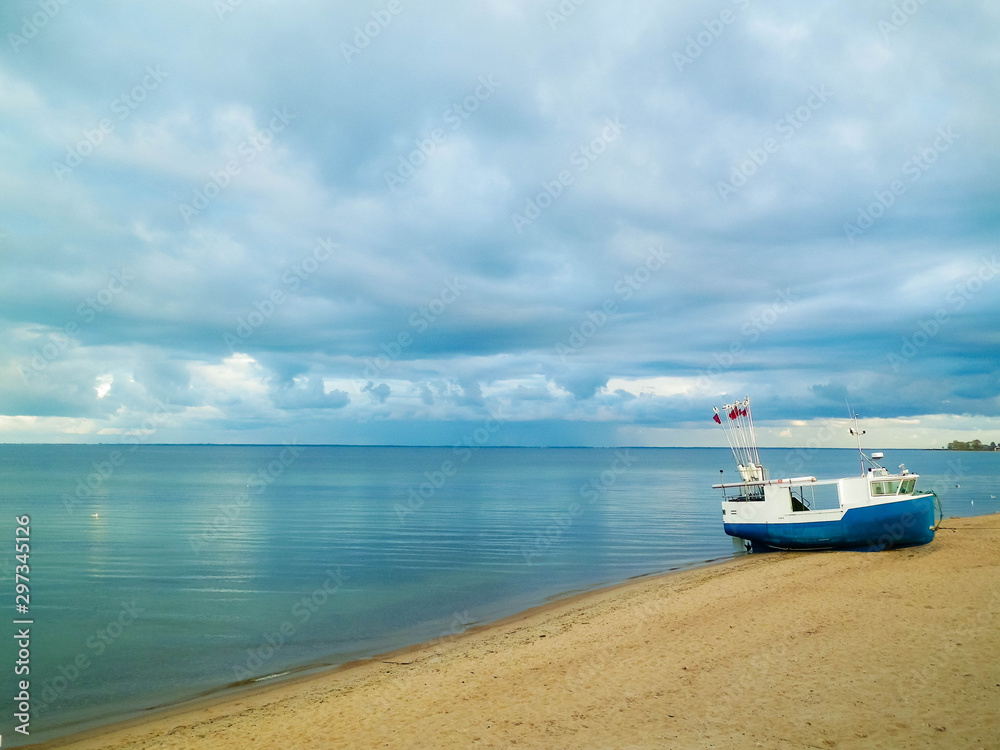 Obraz premium Fishing boat on Baltic Sea coast.