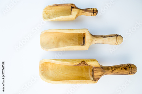 Traditional wood object wooden scoop or spoon isolated on a white background from various angle and top view