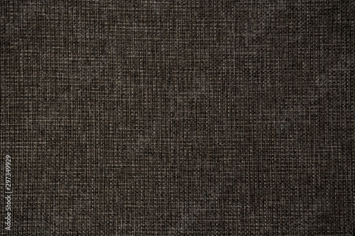 The texture of the knitted gray fabric for the background. Rough surface