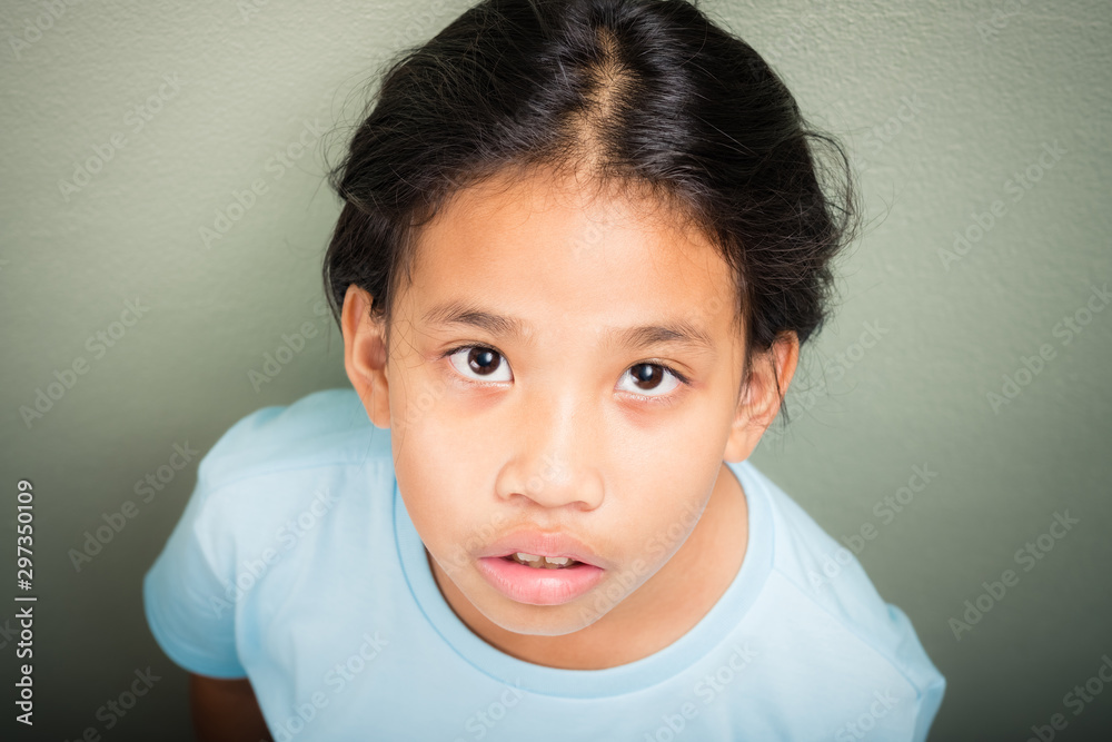 Nine Years Old Thai Girl Looking up to Camera Nine Years Old Thai Girl Looking up to Camera