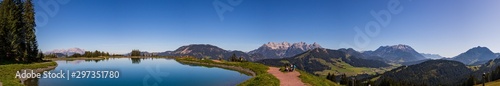High resolution stitched panorama of a beautiful alpine view with reflections in a lake at Fieberbrunn  Tyrol  Austria
