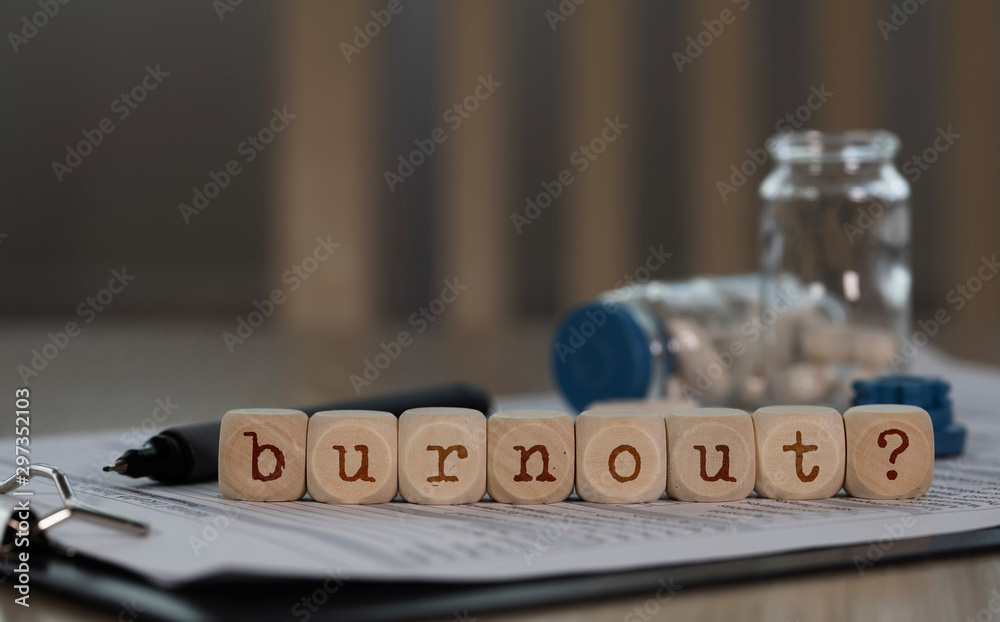 Word BURNOUT composed of wooden dices. - obrazy, fototapety, plakaty 