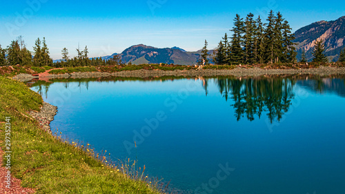 Beautiful alpine view with reflections in a lake at Fieberbrunn, Tyrol, Austria