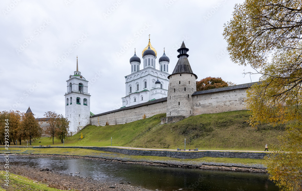 Pskov in October. The banks of the Pskova river and the Pskov Kremlin. Trinity cathedral, Pskov, Russia