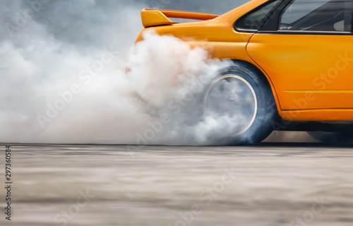 Race drift car burning tires on speed track Fototapet