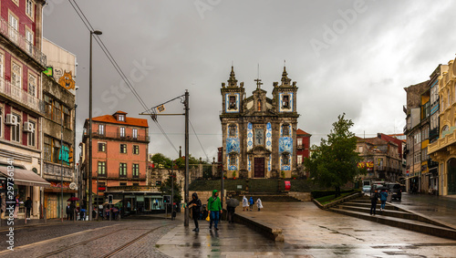 A square in Porto in the rain and an old church, Portugal