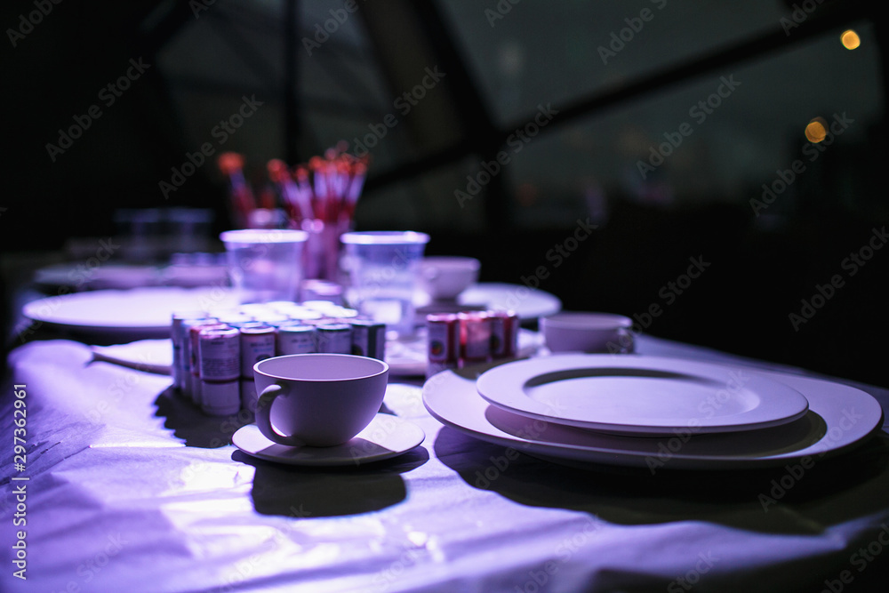 catering at a top event, glasses and flowers on the table, preparation for a significant event, beautiful dishes and glasses on the table, New Year's holiday table catering at a top event, glasses and flowers on the table, preparation for a significant event, beautiful dishes and glasses on the table, New Year's holiday table