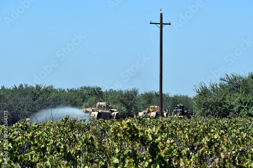 water truck spray in grape farm