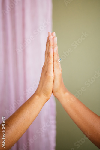 Brown hands of partners in studio environment