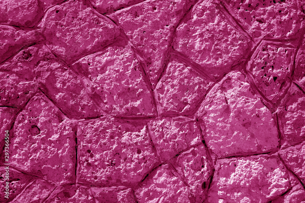 Wall made of old stones in pink tone. Wall made of old stones in pink tone.