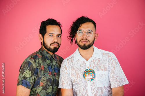 Portrait of Latino twin brothers in studio environment photo