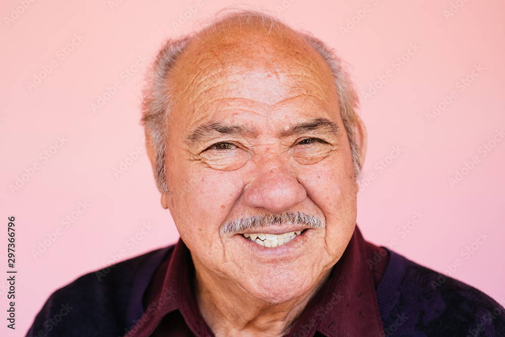 Portrait of eldery Latino grandfather in studio environment Portrait of eldery Latino grandfather in studio environment