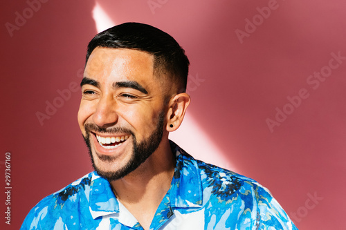 Portrait of Latino gay man in studio environment