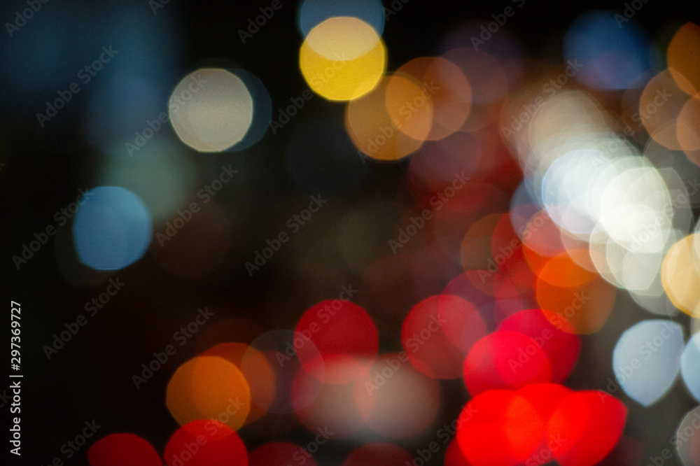 Fototapeta premium Bokeh night light on the avenue Light night at city blue bokeh sky festival abstract background blur lens flare reflection beautiful circle street with dark