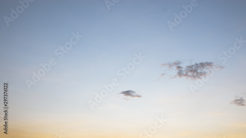Beautiful view of sky and cloud at dusk,Sky Bright Blue Orange And Yellow Colors in twilight after sunset time.
