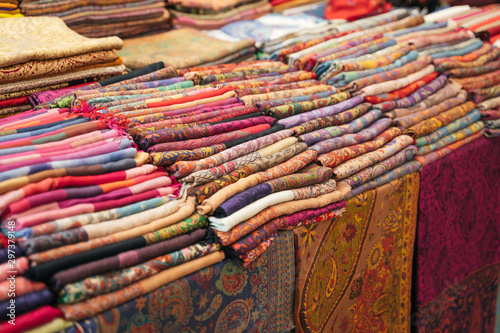 Traditional Indian fabric store. Colorful traditional indian textile fabric wrap scarfs