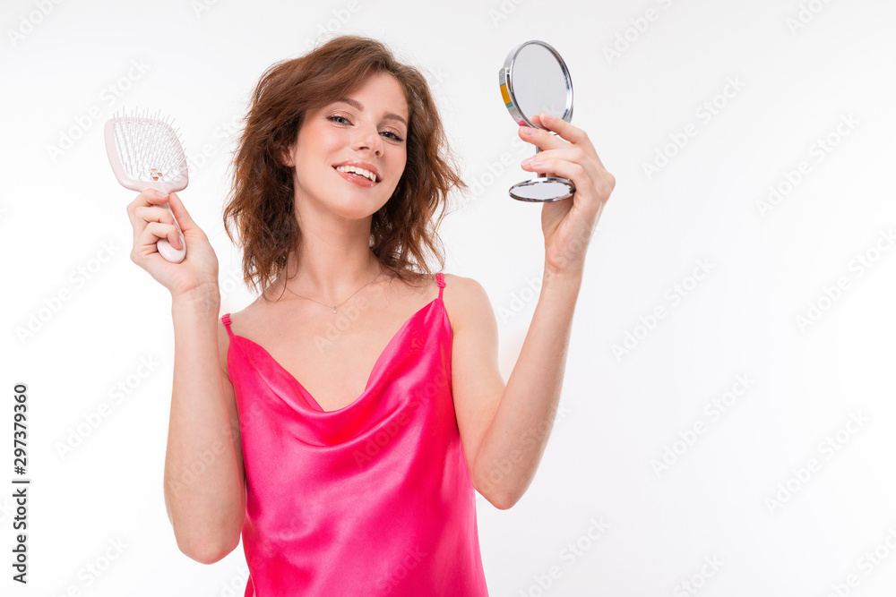 blogger make-up artist teaches to apply cosmetics, portrait of a girl on a white background blogger make-up artist teaches to apply cosmetics, portrait of a girl on a white background