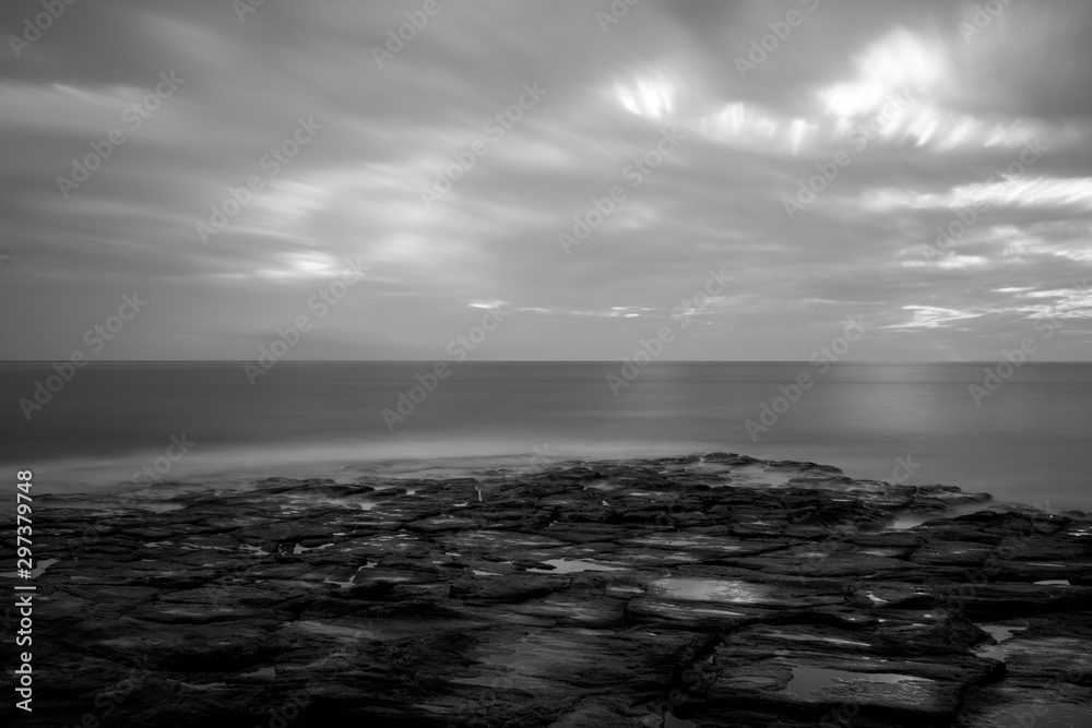 Fototapeta premium Black and White dramatic seascape of atlantic ocean coastline, long exposure.