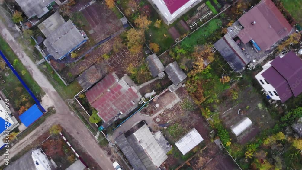 Aerial view drone over of the village and fields. Aerial view drone over of the village and fields.