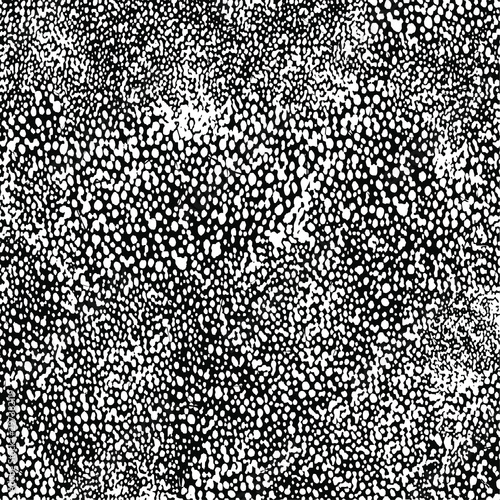 Small uneven spots and particles of debris. Abstract vector texture.  Distressed uneven background. Grunge texture overlay with fine grains isolated on white background. Vector illustration. EPS10.
