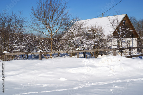 Winter house on winter snowy panoramic landscape
