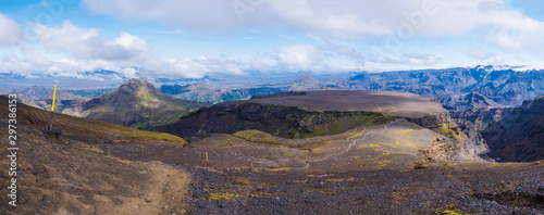 Panoramic breathtaking view on Landscape of Godland and thorsmork over plateau of Morinsheidi with rugged green moss covered rocks and hills. Iceland, Fimmvorduhals hiking trail. Summer cloudy day. photo