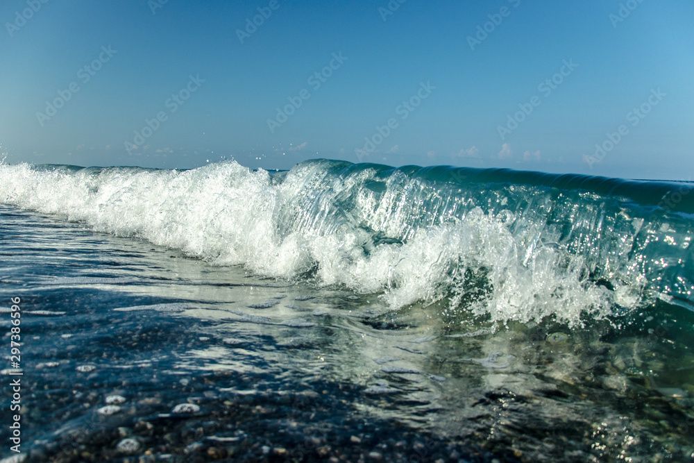 waves crashing on rocks