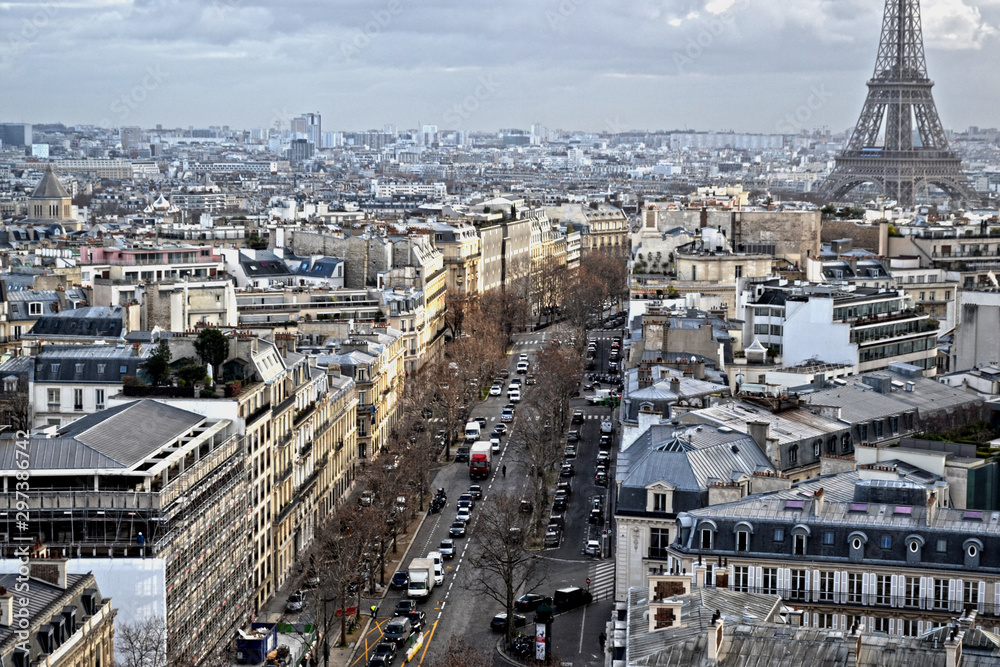 Paris, France - January 13th 2019 : view of Paris from the triumphal arch. You can see an avenue and a part of the Eiffel tower.