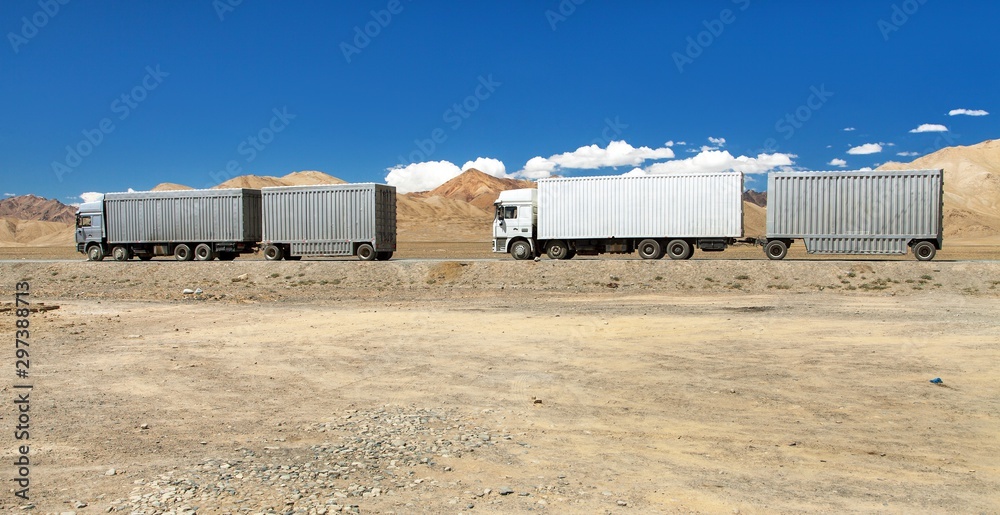 Pamir highway or pamirskij trakt and white truck