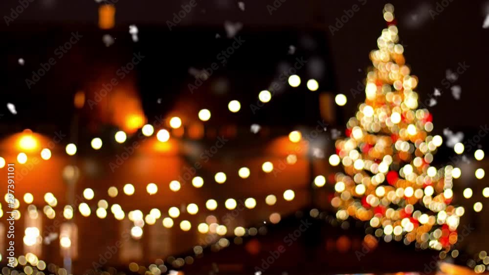 holidays and celebration concept - evening christmas market at old town hall square in tallinn